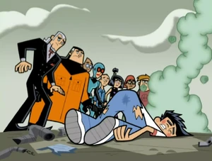 Vlad and everyone sees Danny coming out of the wreckage.