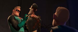 Incrediboy seeing Mr. Incredible hold Bomb Voyage.