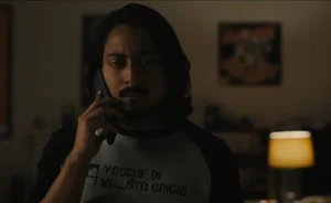 Jason walking towards the fridge