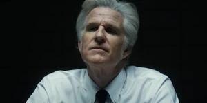 Brenner glaring at Joyce who angrily refuses to cooperate.