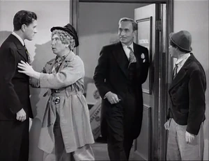 Grover smugly trying to look innocent