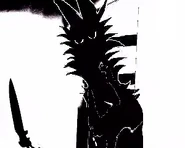 Dogtooth holding what he was reaching in his mouth for, a knife.