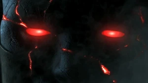 A close-up of Darkseid's red eyes.