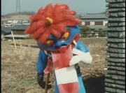 An injured Namenameda attempts to deliver a rose to Darunia.