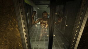 Frank failing to intercept Waylon at a decontamination chamber.