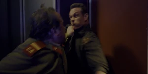 Grigori about to strike Hopper as they fight.