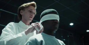 One blindfolding Six.