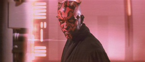 Maul stares angrily at Qui-Gon.