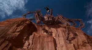 Loveless plummeting off the cliff to his death.