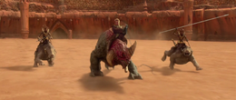 Anakin broke his chains and rode the reek around the arena.