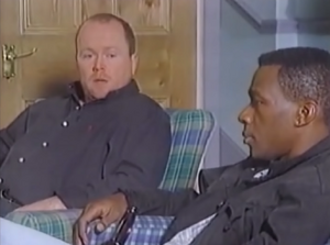 Phil Mitchell chatting with local plumber Alan Jackson.