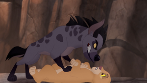 Janja holding Kiara at his mercy