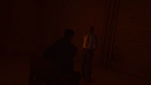 Frankie Niagara 1.png (1.43 MB) Frankie standing in front of the bound and barely conscious Max.