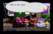 Vivian giving the Ruby Star to Mario, after defeating Doopliss....