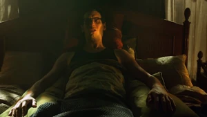 Riddler wakes up after being unfrozen.