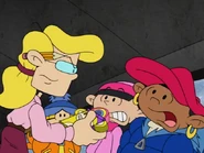 Anna confiscating Numbuh 5's communicator.
