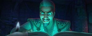 Magnifico reading how to create a scepter in his spell book.
