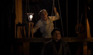 Adam working the ropes for his "marionettes".
