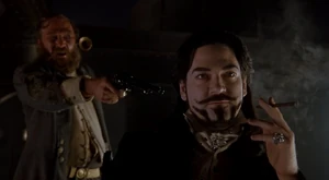 Arliss Loveless 3.jpg (70 KB) Loveless being threatened with a gun by McGrath, to no avail.