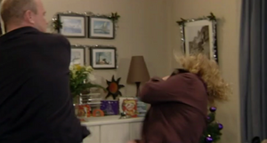 Phil becomes abusive and hits Lisa during their argument on Christmas 2000.