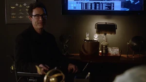 Thawne learning that General Eiling knows Barry's identity.