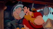 Gaston looks on his face in a mirror