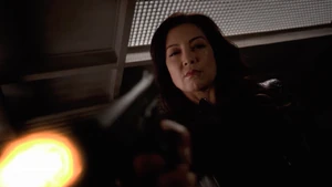 Izel shooting Sarge while possessing May.