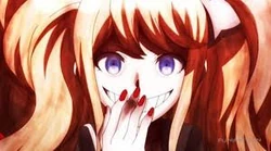 Junko laughing as she watches the world in despair.