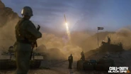 An Iraqi soldier watching a missile firing.