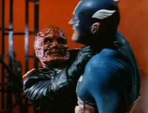 Red Skull defeating Captain America.