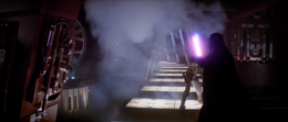 As Luke began to haltingly advance on his opponent, Vader telekinetically tore a fixture of metal pipes off of a wall behind Skywalker and threw it at him.