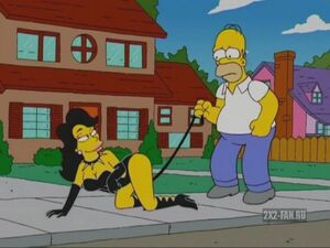 Julia stalking Homer in street.