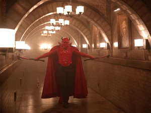 The Red Devil attempts to kill Chanel and Zayday with two axes.