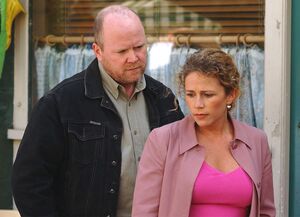 Phil gives Lisa a warning after she sleeps with him behind Mark's back.