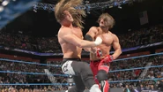 AJ Styles beating down Ziggler.