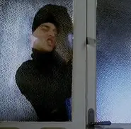 Berardi breaking into the vacation home in disguise