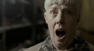 Margaret about to be impaled on a large nail