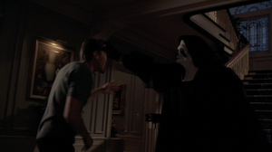 Dawson tries to fight with The Killer.