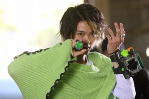 Alain about to place the Necrom Damashii into the Mega Ulorder.