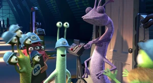 Randall smiles with pride as he receives praise and attention as the new Scare Leader...