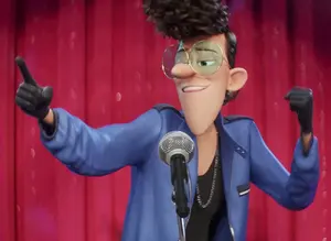 Maxime singing "Everybody Wants To Rule The World".