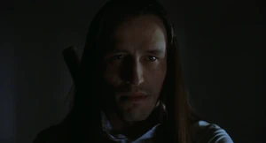 Top Dollar confronting Eric inside a cathedral.