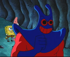 Man Ray's evil grin, plotting to betray SpongeBob and Patrick once set free.