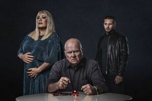Phil with his wife Sharon and employee Keanu from the "Sheanu" storyline poster in 2019.