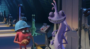 Randall smiles as he sees he's beaten Sulley on the scoreboard by a few points.