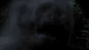 Azazel's spirit being grabbed by John.