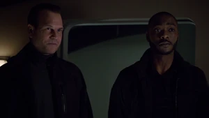 Garrett and Trip arriving on the Bus to retrieve Quinn.