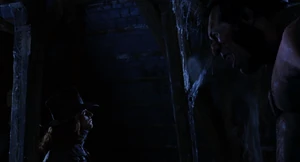 Mr. Hyde blowing a huge smoke ring at Van Helsing who ignores it.