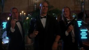 Eddy with Orlando and the other mobsters are glad at first, thinking that they've killed Ipkiss.