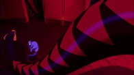 Jafar slithering down towards Genie.